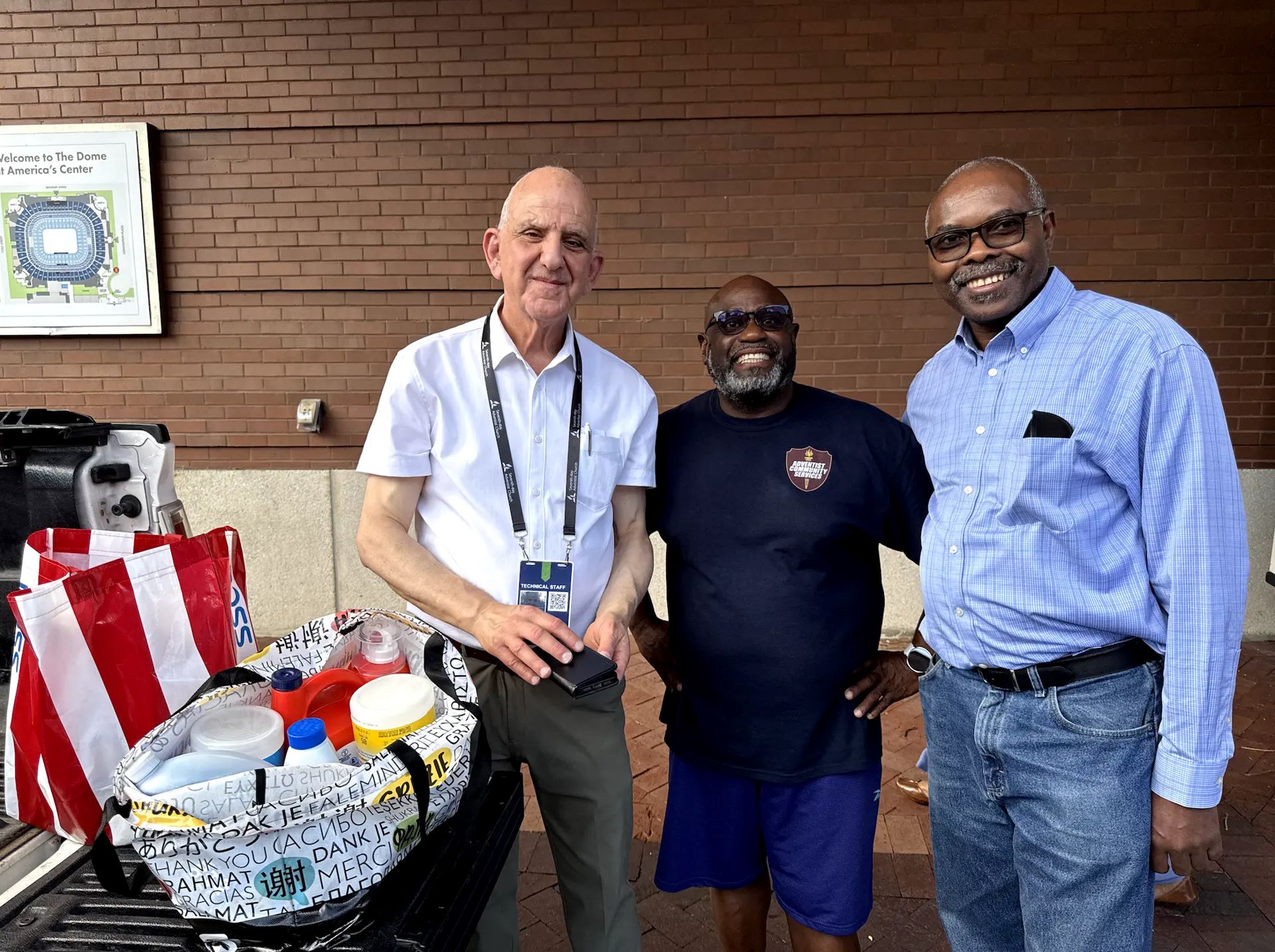 Church members come together to distribute groceries and cleaning supplies to refugee families living in St. Louis.
