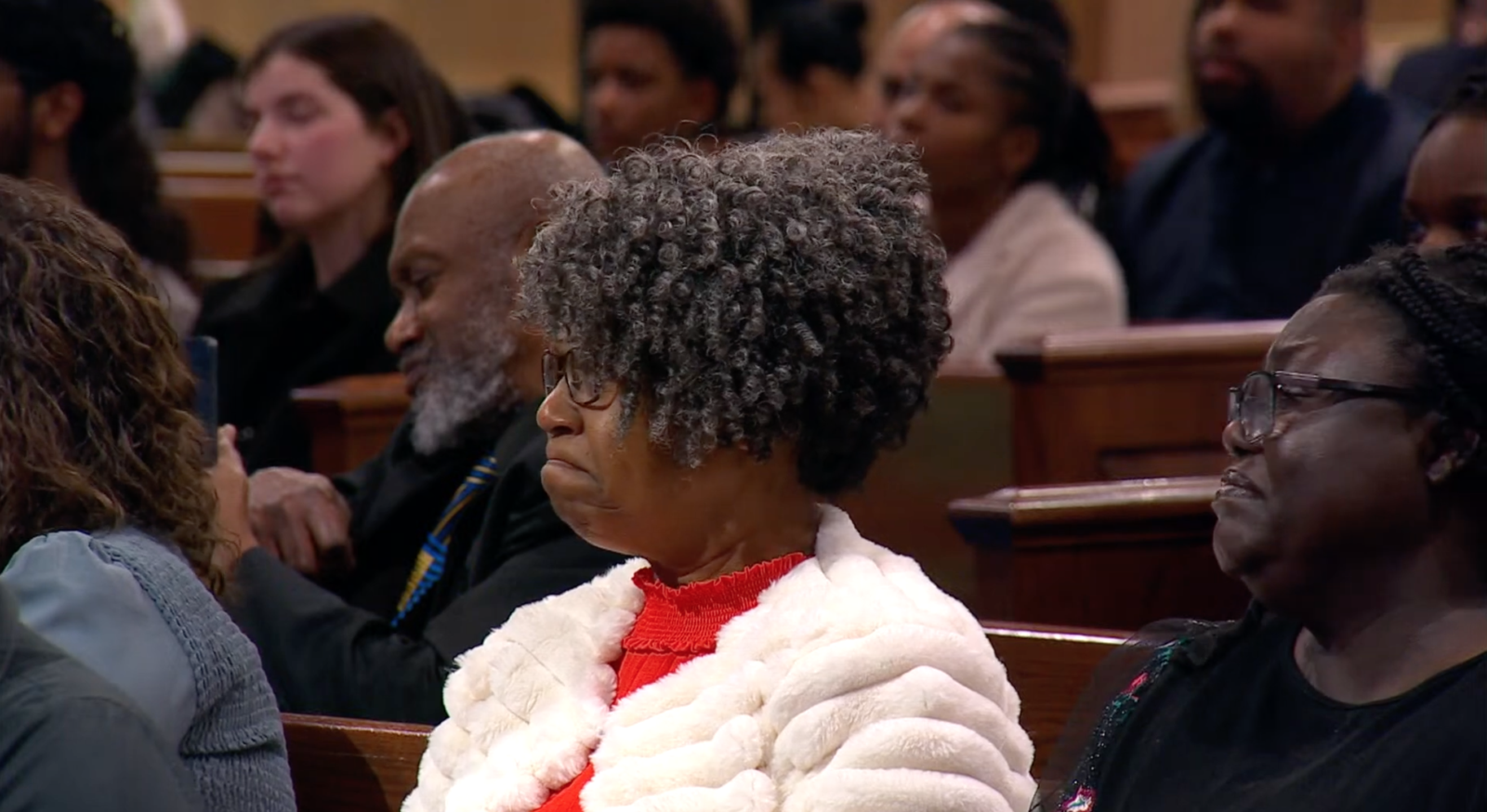 Audience members respond to Esmond’s preaching